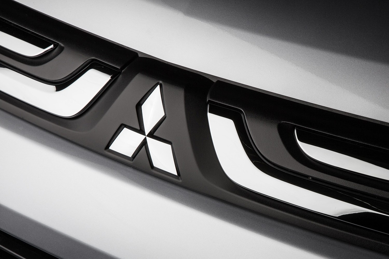 Mitsubishi Outlander GT 4dr SUV Front Badge (2014 model year shown)