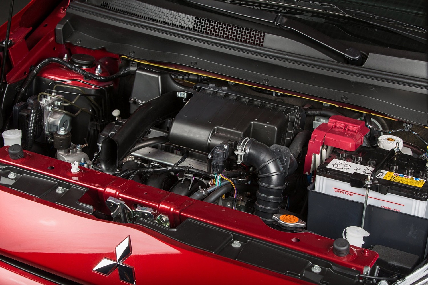 Mitsubishi Mirage ES 4dr Hatchback 1.2L I3 Engine (2014 model year shown)