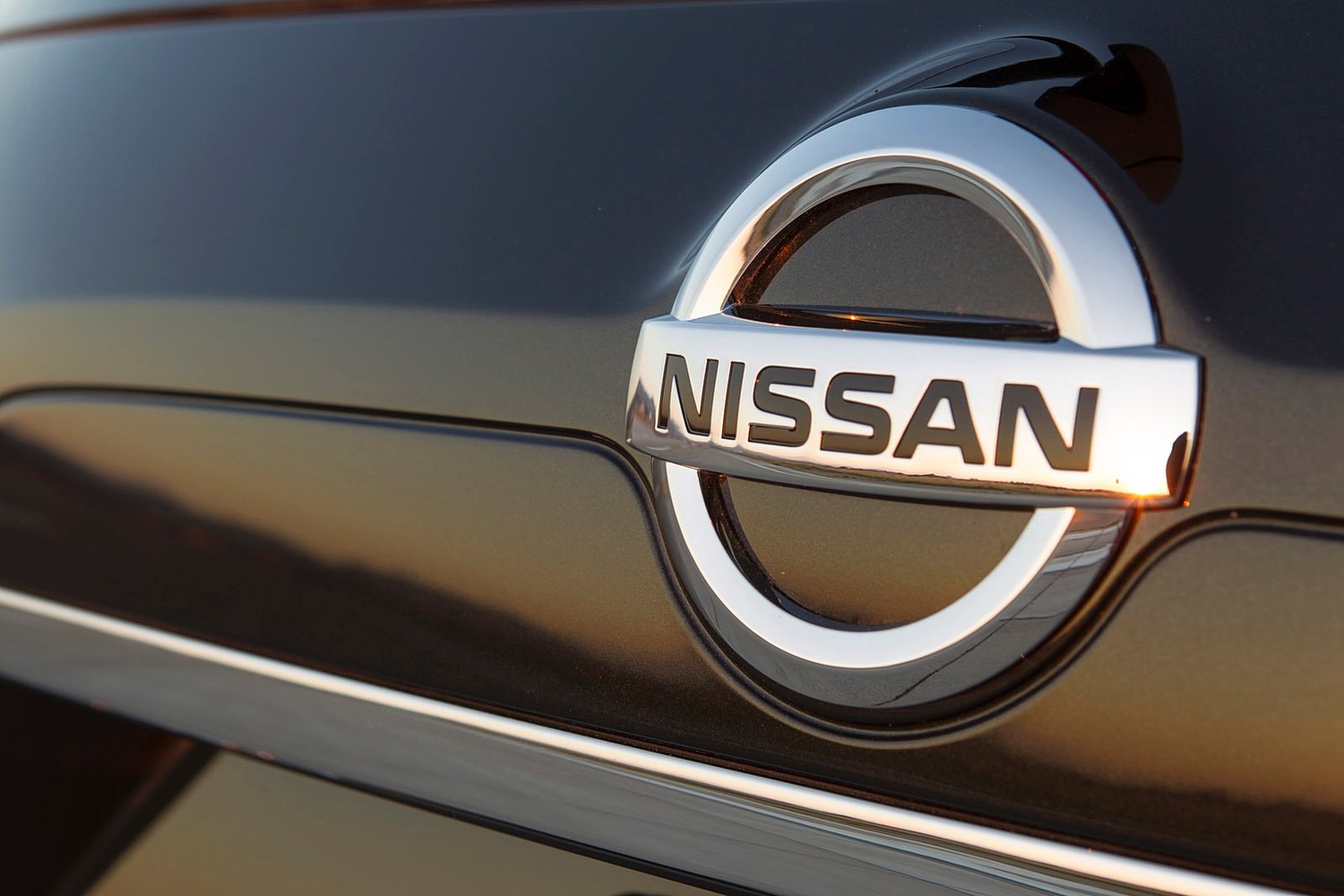 Nissan Rogue SL 4dr SUV Rear Badge (2014 model year shown)