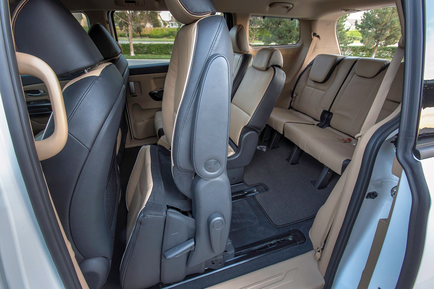 Kia Sedona SX Limited Passenger Minivan Rear Interior Shown (2016 model year shown)