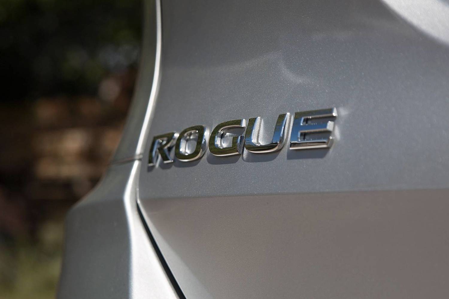 Nissan Rogue SV 4dr SUV Rear Badge (2017 model year shown)