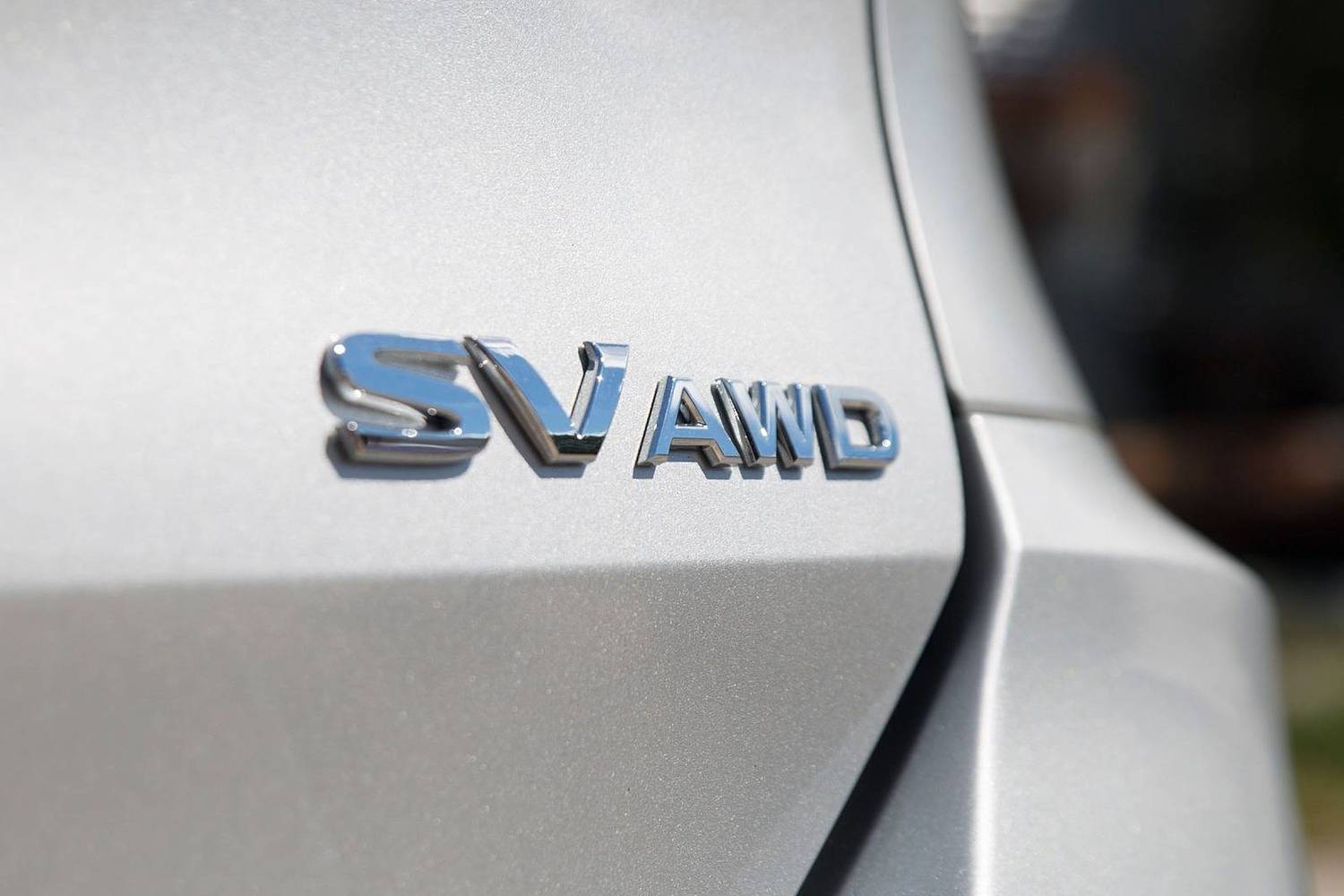 Nissan Rogue SV 4dr SUV Rear Badge (2017 model year shown)