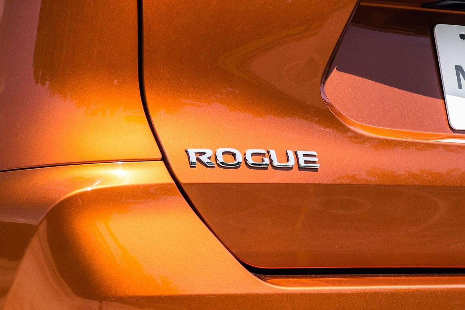 Nissan Rogue SL 4dr SUV Rear Badge (2017 model year shown)